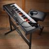 imageAshthorpe 61Key Digital Electronic Keyboard Piano with Light Up Keys Includes Stand Bench Headphones Mic and Keynote Stickers